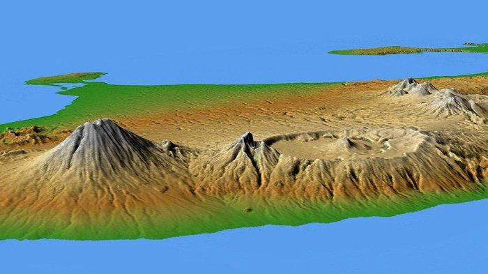 Gunung Agung di kiri; Gunung Batur dengan kalderanya terlihat di kanan.
