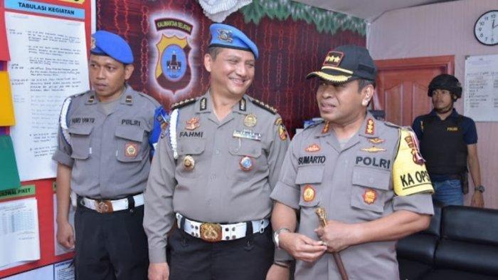 Kombes Pol. Drs. Armia Fahmi (tengah)