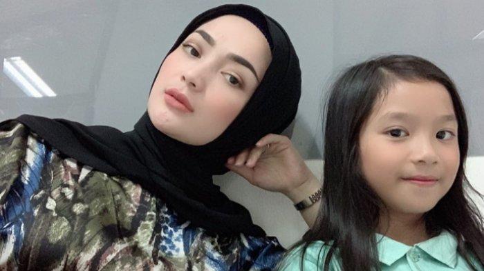 Imel Pitru dan anaknya