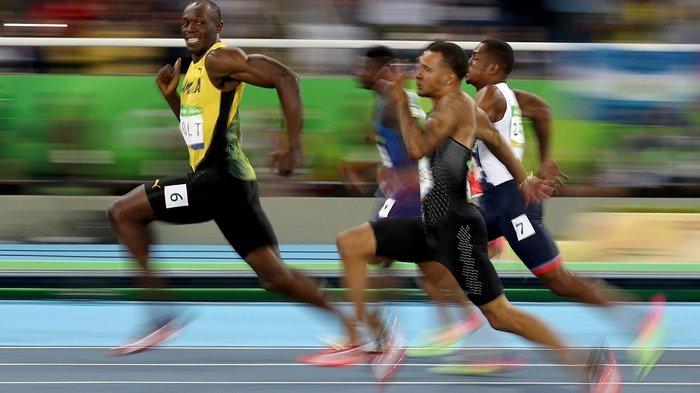 Usai Bolt saat berlari di lintasan 100 meter di Olimpiade Rio 2016.