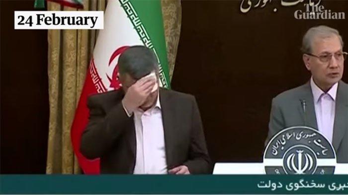 Wakil Menteri Kesehatan Iran, Iraj Harirchi dan juru bicara pemerintah Ali Rabiei