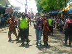 2-warga-diamankan-saat-hendak-bentangkan-poster-jokowi-di-cilacap.jpg