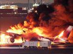 Pesawat-Japan-Airlines-terbakar-di-landasan-pacu-Bandara-Haneda.jpg