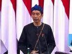 Presiden-Jokowi-mengenakan-baju-kampret-busana-adat-suku-Baduy-luar-2.jpg