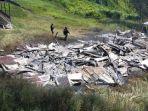 Rumah-guru-yang-dibakar-KKB-di-Kampung-Dambet-Distrik-Beoga.jpg