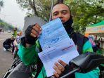 Wawan-pengendara-ojek-online-yang-terkena-tilang-uji-emisi.jpg