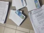 amplop-berisi-uang-rp-50-ribu-di-riau.jpg