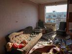 apartemen-atau-rumah-susun-yang-rusak-akibat-serangan-udara-Rusia.jpg