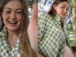 gigi-hadid-tunjukkan-perut-buncitnya.jpg