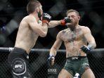 khabib-nurmagomedov-saat-bertarung-dengan-conor-mcgregor-beberapa-waktu-lalu.jpg