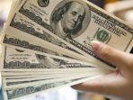 lembaran-uang-dollar-as.jpg