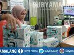 merebaknya-wabah-virus-corona-membuat-permintaan-masker-melonjak-di-kota-malang.jpg