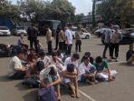 pelajar-dan-sejumlah-massa-bayaran-yang-diamankan-di-mapolres-metro-jakarta-utara.jpg