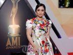 penyanyi-gita-gutawa-saat-menghadiri-acara-anugerah-musik-indonesia-ami-awards-2016.jpg
