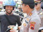 polisi-tilang-motor.jpg