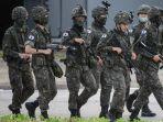 tentara-militer-korea-selatan-berpatroli-di-inje.jpg