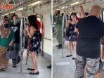 wanita-marah-di-mrt-karena-ada-penumpang-lain-berdiri-di-dekatnya.jpg