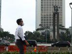 warga-beraktivitas-menggunakan-masker-di-kawasan-bundaran-hi-jakarta-terkait-coroba.jpg