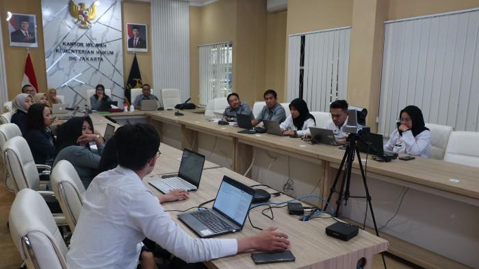 Suasana rapat pleno Harmonisasi Raperda tentang Pembangunan Keluarga