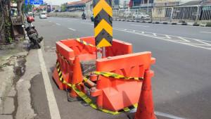 JALAN-RUSAK-Jalan-amblas-di-Jalan-Jenderal-Basuki-Rahmat-tepatnya-Underpass-DI-Panjaitan.jpg