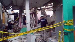 Polisi-berjaga-di-dekat-lokasi-terjadinya-ledakan-misterius-di-Pondok-Cabe-Ilir.jpg