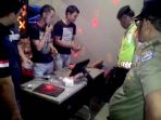 20170525razia-tempat-hiburan-malam-di-depok-perempuan-pemandu-lagu-positif-narkoba_20170525_134217.jpg