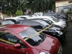 20180207polisi-ungkap-kasus-penggelapan-mobil-di-tangerang-selatan1_20180207_201352.jpg