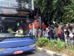 20180311berita-foto-keliling-jakarta-gratis-begini-antusiasme-warga-naik-bis-wisata2_20180311_213122.jpg
