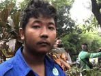 Adit-selaku-supir-kontainer-pengangkut-batu-granit-yang-terguling.jpg
