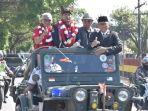 Bripda-Randa-Rian-Desta-saat-diarak-keliling-Kota-Padang-bersama-Pemprov-Sumbar-dan-Polri.jpg