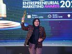 CMO-of-The-Year-2023-di-ajang-BEMA-2023-diraih-Direktur-Utama-JXB-Novita-Dewi.jpg
