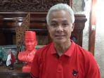 Ganjar-Pranowo-mengenakan-baju-PDIP.jpg