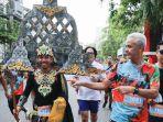 Gubernur-Jawa-Tengah-Ganjar-Pranowo-di-acara-Bank-Jateng-Friendship-Run-di-Makassar.jpg