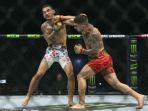 Ilia-Topuria-mengalahkan-Max-Holloway-dengan-Pukulan-Keras-di-UFC-308.jpg