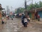 Jalan-Cikalangan-di-Kecamatan-Cileungsi-Kabupaten-Bogor-Jawa-Barat-rusak-parah.jpg