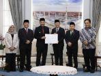 Ketua-DPRD-Kabupaten-Bekasi-BN-Holik-Qodratullah-dan-Dani-Ramdan.jpg