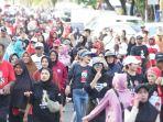 Masyarakat-mengikuti-jalan-sehat-di-Landmark-Ternate-Maluku-Utara-pada-Minggu-3112024-lalu.jpg