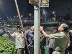 Munjirin-memimpin-pencopotan-alat-peraga-kampanye-di-Jakarta-Selatan.jpg