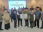 Nur-Azizah-Tamhid-Salurkan-Bantuan-ke-Makassar.jpg