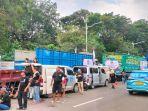 Puluhan-sopir-truk-lakukan-aksi-unjuk-rasa-terkait-aturan-ODOL.jpg