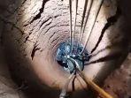 Turun-ke-Sumur-Sedalam-12-Meter-Selamatkan-iPhone.jpg