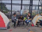aksi-unjuk-rasa-kreatif-di-depan-gedung-dpr-ri-memprotes-rkuhp.jpg