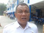 kepala-dinas-ketenagakerjaan-disnaker-kota-tangerang-ujang-hendra-gunawan-1.jpg
