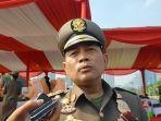 kepala-satpol-pp-dki-jakarta-arifin-saat-ditemui-di-monas-jakarta-pusat-kamis-1632023.jpg