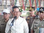 pj-gubernur-dki-jakarta-heru-budi-hartono-meninjau-pemukiman-di-bantaran-kali-ciliwung.jpg