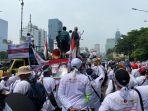ribuan-tenaga-kesehatan-berunjuk-rasa-menuntut-pembatalan-ruu-omnibus-law-tentang-kesehatan.jpg
