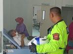 satuan-lalu-lintas-polres-bogor-memberikan-pertolongan.jpg