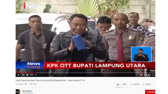 bupati-lampung-utara-senyum-senyum-digiring-ke-kpk.jpg