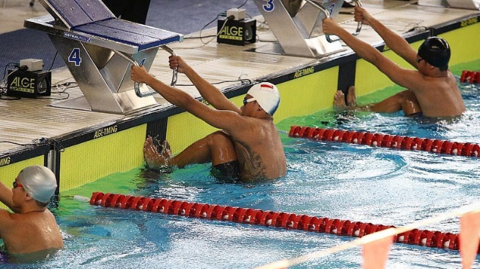 Tim Renang PON DKI Jakarta Tertahan di Bandara Hongkong dan Belum Bisa Pulang karena Masalah Ini