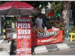 Pizza-Siboli-membuka-stan-di-CFD-Jalan-Slamet-Riyadi-Kota-Solo-pada-Minggu-2742025.jpg